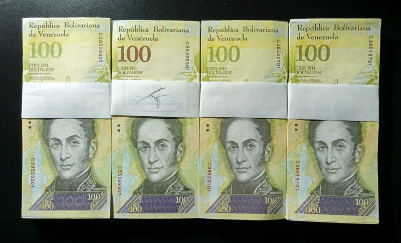 Venezuela 400 Pieces. 100.000 BsF 2017 4 Packs AU/UNC. 3 are Unc, 1 is more AU. ...