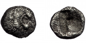 IONIA, Uncertain ( Silver.0.18 g. 7 mm) Late 6th-early 5th century BC. AR Tetartemorion
Head of lion left 
Rev: Quadripartite incuse square