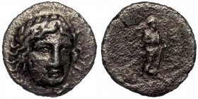 Caria. Mausollos ( Silver. 3.06 g. 16 mm) (377-353 BC) AR Drachm - 
Head of Helios facing, turned slightly to right.
Rev: Zeus Labraundos with double-...