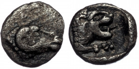CARIA. Uncertain ( Silver. 0.25 g. 7 mm) Tetartemorion (4th century BC).
 Ram's head right.
Rev: Roaring lion's head right.
SNG Keckman 903–8.