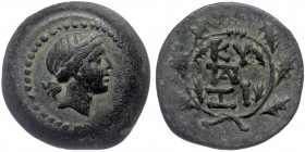MYSIA, Kyzikos. ( Bronze. 6.39 g. 20 mm) 2nd-1st centuries BC.
Laureate head of Kore Soteira right
Rev: Monogram between KV/ZI; all within wreath;
Von...