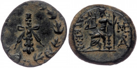 CILICIA. Tarsos.( Bronze. 3.69 g. 17 mm) 164-27 BC. AE
Club tied with fillets, within oak wreath.
Rev. ΤΑΡΣΕΩΝ/ Zeus seated left on throne, holding Ni...