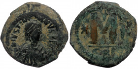 JUSTIN I, ( Bronze. 18.61 g. 35 mm) (518-527), AE follis, Constantinople mint
diademed, draped and cuirassed bust right 
Rev: Large M between two star...