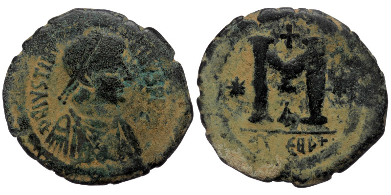 Justinian I AD 527-565. ( Bronze. 15.07 g. 33 mm)Theoupolis (Antioch) Follis or ...