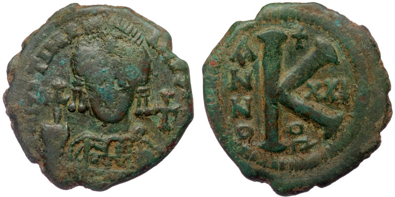 (Bronze, 10,12, 29mm) Justinian I (527-565). AE half follis, Antioch mint, dated...