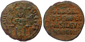 (Bronze, 6,85g, 26mm) BASIL I the Macedonian (867-886) AE follis, Constantinople, 879-886. 
Obv: +bASILIO-S-bASILЄVS - Basil I seated facing on throne...