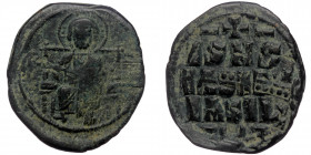 ANONYMOUS ( Bronze. 9.26 g. 29 mm) Constantine IX (1042-1055).
Christ seated facing on throne 
Rev: Legend in 3 lines.
Sear 1836.