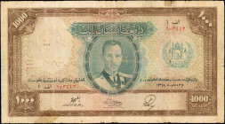 AFGHANISTAN. Da Afghanistan Bank. 1000 Afghanis, 1939. P-27A. Good.

Depicted at center is King Muhammad Zahir, whilst arms are found at right and a...