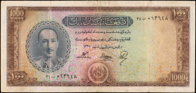 AFGHANISTAN. Da Afghanistan Bank. 1000 Afghanis, 1948. P-36. Good.

Colorful underprints stand out on the obverse along with a dark brown border des...
