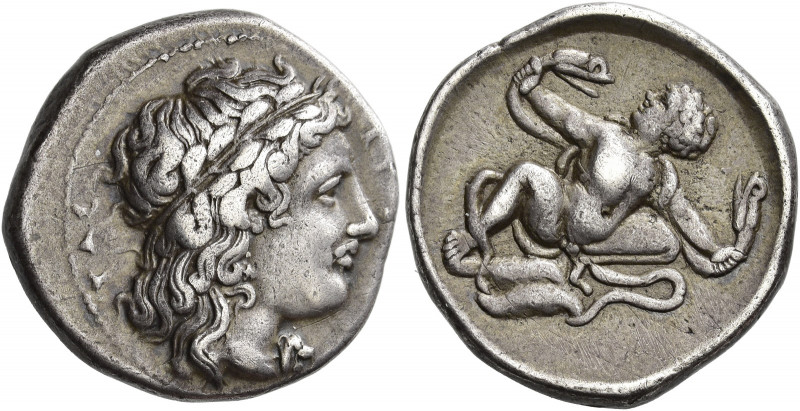 Croton 
Nomos circa 400-325, AR 7.57 g. ΚΡΟ[ΤΩΝΙΑ] – ΤΑΣ Laureate head of Apoll...