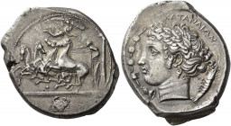 Catana 
Tetradrachm signed by Euainetos circa 410-405, AR 17.26 g. Fast quadriga to l. about to steer around an Ionic column; charioteer wears long c...