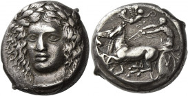 Catana 
Tetradrachm signed by Heracleidas circa 405-402, AR 17.32 g. Laureate head of Apollo, facing three-quarters l., his hair falling in loose cur...