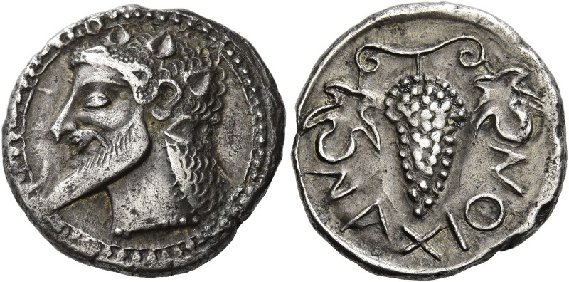 Naxos 
Chalcidian drachm circa 500, AR 5.68 g. Ivy-wreathed head of Dionysus l....