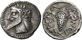 Naxos 
Chalcidian drachm circa 500, AR 5.68 g. Ivy-wreathed head of Dionysus l., with pointed beard and hair in form of dots, falling in waves over n...