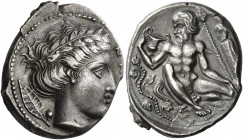 Naxos 
Didrachm circa 415-403, AR 7.41 g. NA[ΞIΩN] Laureate head of Apollo r.; behind, laurel leaf with berry. Rev. Naked Silenus squatting, holding ...