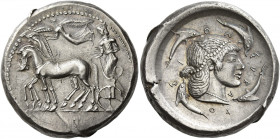 Syracuse 
Tetradrachm circa 485-480, AR 17.11 g. Slow quadriga driven l. by charioteer, holding reins; above, Nike flying l. to crown horses. Rev. ΣV...