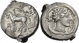 Syracuse 
Tetradrachm circa 450-440, AR 17.03 g. Slow quadriga driven l. by charioteer, holding kentron and reins; above, Nike flying l. to crown the...