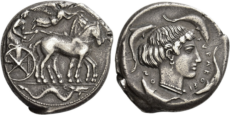 Syracuse 
Tetradrachm circa 450-440, AR 17.06 g. Slow quadriga driven r. by cha...