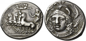 Syracuse 
Tetradrachm signed by Eukleidas circa 413-399, AR 17.12 g. Fast quadriga driven l. by female charioteer, holding reins in l. hand and raisi...