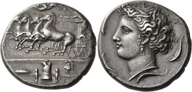 Syracuse 
Decadrachm signed by Euainetos circa 400, AR 43.26 g. Fast quadriga driven l. by charioteer, holding reins and kentron; in field above, Nik...