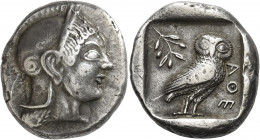 Attica, Athens 
Tetradrachm, Civic mint circa 510-500/490, AR 17.09 g. Head of Athena r., wearing crested Attic helmet and disc earring. Rev. AΘΕ Owl...
