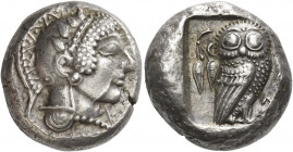 Attica, Athens 
Tetradrachm circa 475-470, AR 17.20 g. Head of Athena r., wearing round earring and crested helmet decorated with zig-zag and pellet ...