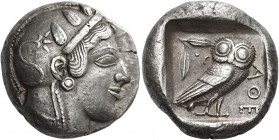 Attica, Athens 
Tetradrachm circa 470, AR 17.19 g. Head of Athena r., wearing crested Attic helmet and disc earring; bowl ornamented with spiral and ...
