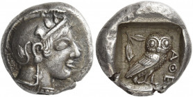 Attica, Athens 
Drachm circa 470-460, AR 4.25 g. Head of Athena r., wearing crested Athenian helmet and disc earring; bowl ornamented with spiral and...