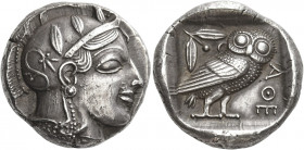 Attica, Athens 
Tetradrachm circa 455, AR 17.30 g. Head of Athena r., wearing crested Attic helmet and disc earring; bowl ornamented with spiral and ...