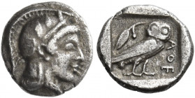 Attica, Athens 
Obol circa 450-430, AR 0.65 g. Head of Athena r., wearing crested Attic helmet with three olive leaves over visor and spiral palmette...