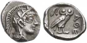 Attica, Athens 
Hemiobol circa 450-430, AR 0.34 g. Head of Athena r., wearing crested Attic helmet. Rev. AΘE Owl standing r. with folded wings, head ...