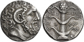 Cyrene 
Tetradrachm circa 300, AR 14.38 g. Head of Zeus Ammon r., with a ram’s horn. Rev. KY – PH Silphium plant with three pairs of leaves; in field...