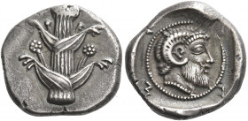 Euesperides 
Drachm circa 460, AR 3.33 g. Silphium plant. Rev. E – Y – E – Σ Bearded and horned head of Zeus Ammon r. within circular dotted border. ...