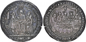 Germany 
Lübeck, Marriage silver medal of 1/2 Taler, no date, struck c. 1600, 13.90g. Christ, wearing nimbus crown, standing between bride and groom....