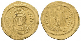 JUSTINIAN I (527-565). GOLD Solidus.
Obv: D N IVSTINIANVS P P AVC.
Helmeted and cuirassed bust facing, holding globus cruciger and shield.
Rev: VICTOR...