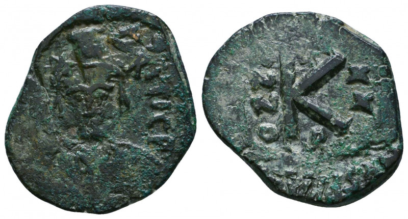 Phocas (602-610). Ae. Follis.

Weight: 6.2 gr
Diameter: 25 mm