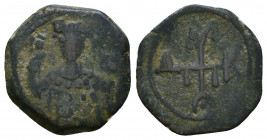 Manuel I Comnenus. 1143-1180. Æ Half Tetarteron. 
Uncertain Greek mint. Struck circa 1143-1152. Monogram of Manuel 
Crowned facing bust, holding labar...