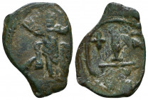 BYZANTINE EMPIRE. 7th - 11th Century. AE 

Weight: 3.9 gr
Diameter: 26 mm
