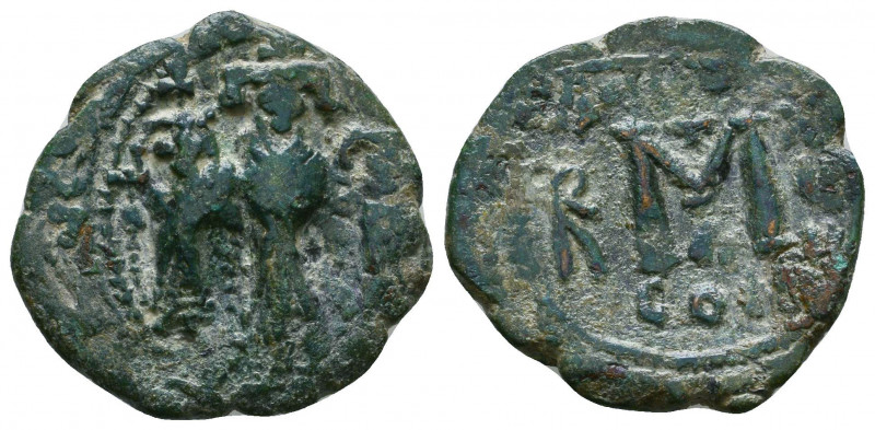 BYZANTINE EMPIRE. 7th - 11th Century. AE 

Weight: 4.3 gr
Diameter: 22 mm