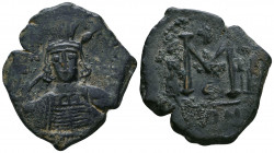 Constantine IV Pogonatus, with Heraclius and Tiberius. 668-685. Æ Follis. Constantinople mint, 3rd officina. 
Cuirassed bust facing, wearing helmet wi...