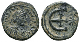Justinian I (527-565). Æ. 

Weight: 2.4 gr
Diameter: 16 mm