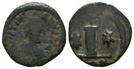 Justinian I (527-565). Æ. 

Weight: 2.9 gr
Diameter: 18 mm