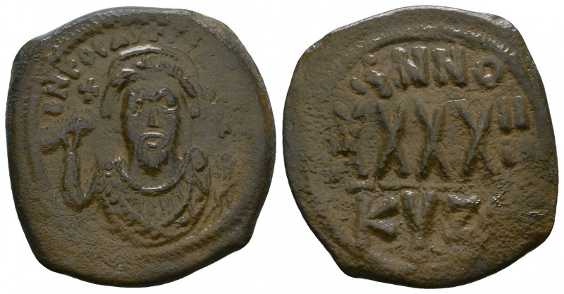 Phocas (602-610) AE Follis

Weight: 9.5 gr
Diameter: 30 mm