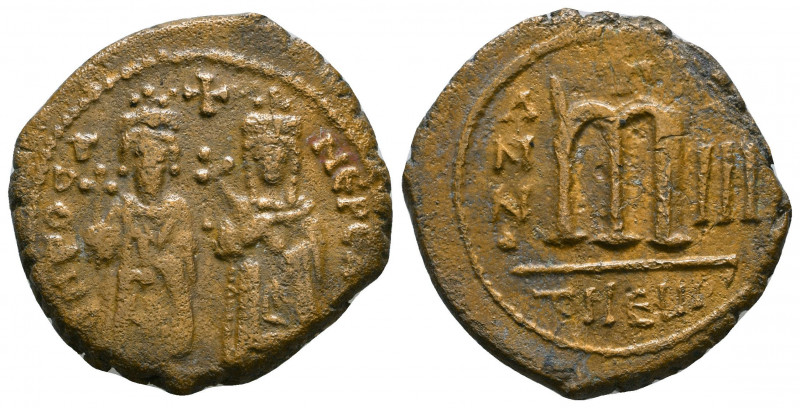 Phocas (602-610) AE Follis

Weight: 10.5 gr
Diameter: 27mm