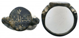 Ancient Bronze Ring with arabic inscription on bezel,

Weight: 5.0 gr
Diameter: 22 mm
