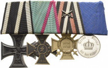 Ordensspangen
Spange mit 4 Auszeichnungen Preußen - Eisernes Kreuz 2. Klasse 1914. Anhalt - Friedrich-Kreuz. Drittes Reich Ehrenkreuz des Weltkrieges...