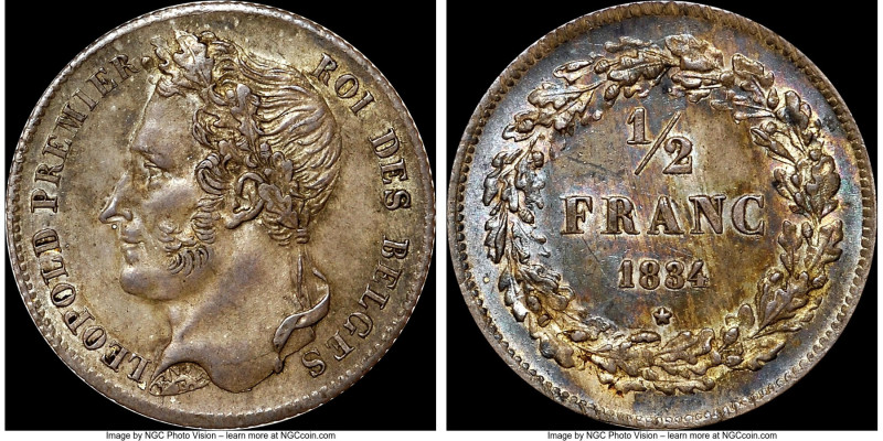 Leopold I 1/2 Franc 1834 MS63 NGC, KM6. A stunning coin blanketed in an advanced...