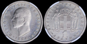 GREECE: 1 Drachma (1954) in copper-nickel with head of King Paul facing left and inscription "ΠΑΥΛΟΣ ΒΑΣΙΛΕΥΣ ΤΩΝ ΕΛΛΗΝΩΝ". Inside slab by NGC "MS 65"...