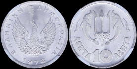 GREECE: 10 Lepta (1973) in aluminum with phoenix and inscription "ΕΛΛΗΝΙΚΗ ΔΗΜΟΚΡΑΤΙΑ". Inside slab by NGC "MS 66". Cert number: 5779887-032. (Hellas ...