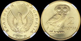 GREECE: 2 Drachmas (1973) in copper-zinc with phoenix and inscription "ΕΛΛΗΝΙΚΗ ΔΗΜΟΚΡΑΤΙΑ". Owl on reverse. Inside slab by NGC "MS 68 / REPUBLIC". Ce...